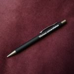 Metal pen with engraved inscription "Vilniaus universitetas".